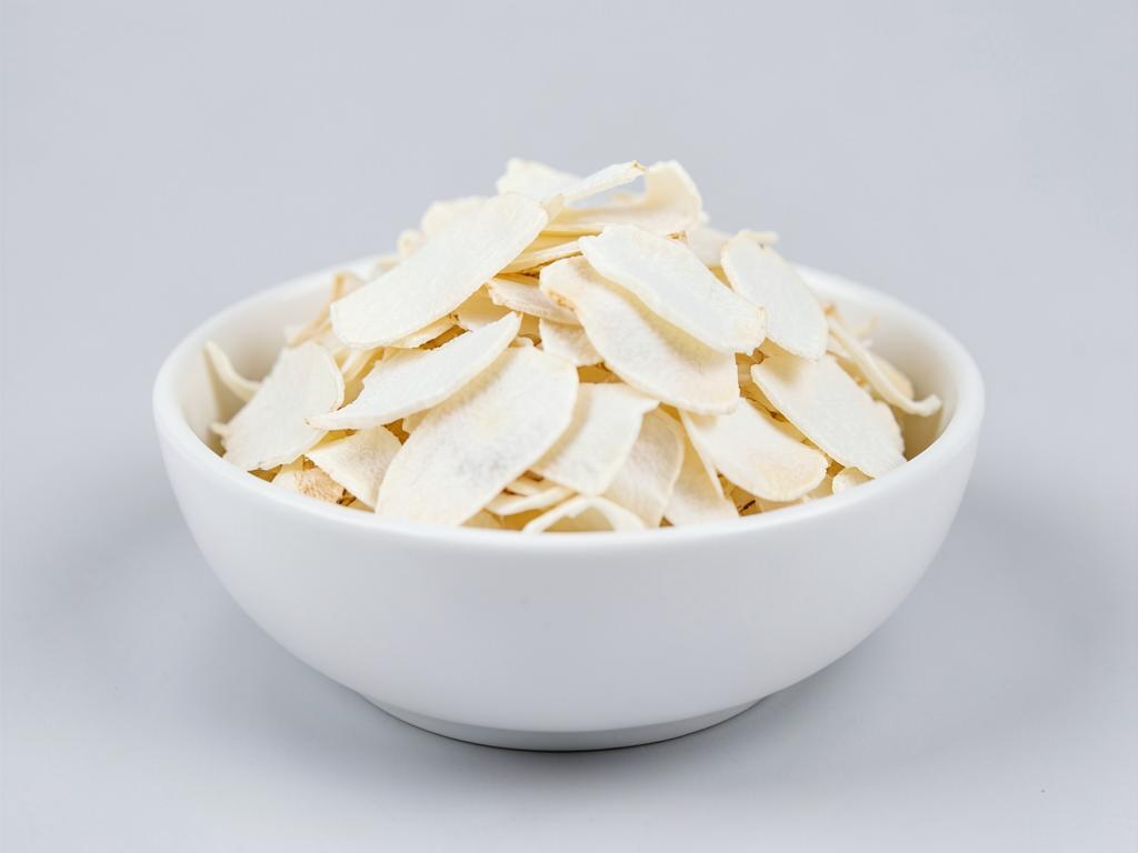 Dehydrated Garlic Flakes supplied by Nethra Global Exim